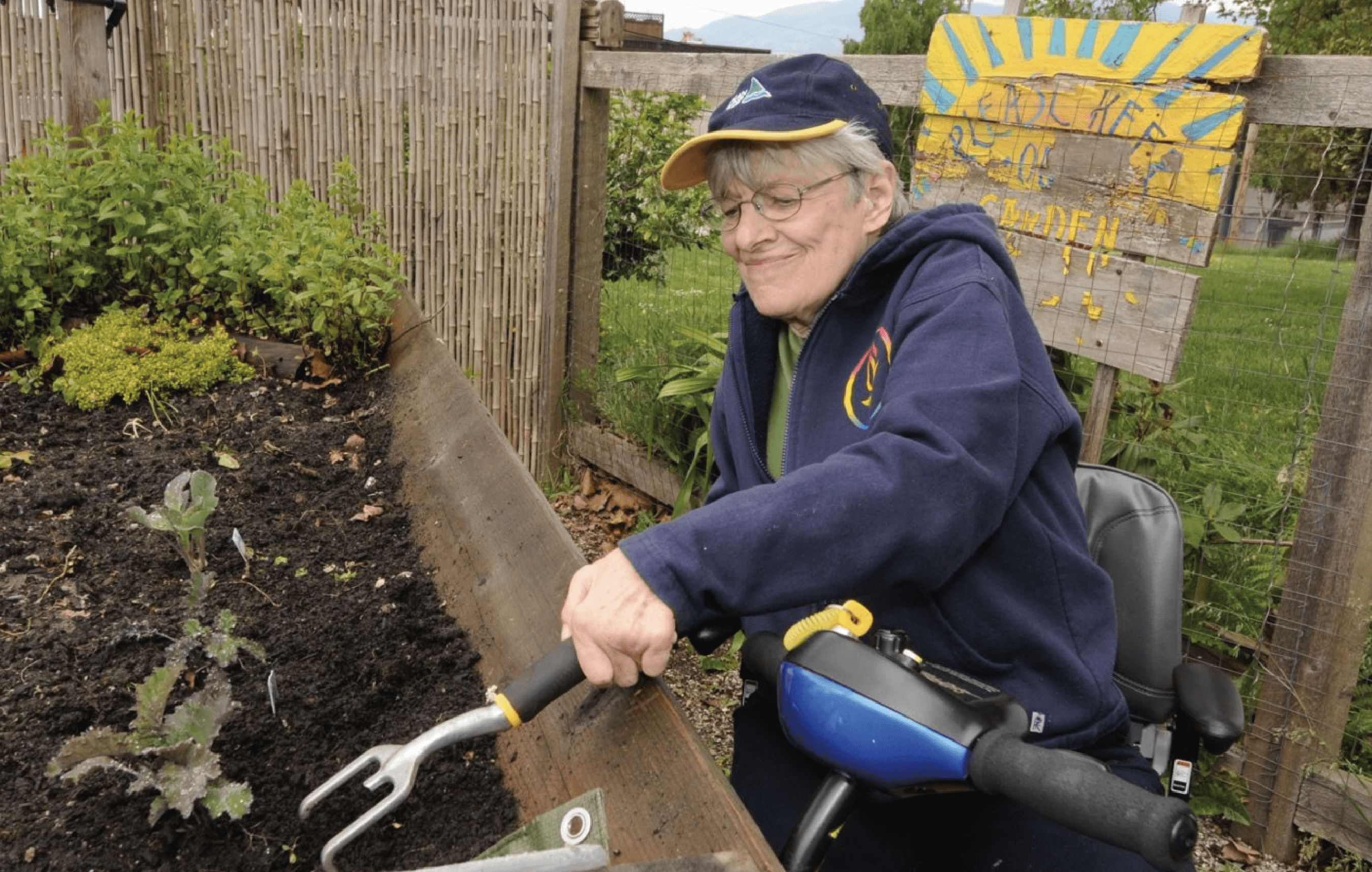 DIGA member working in accessible garden.
