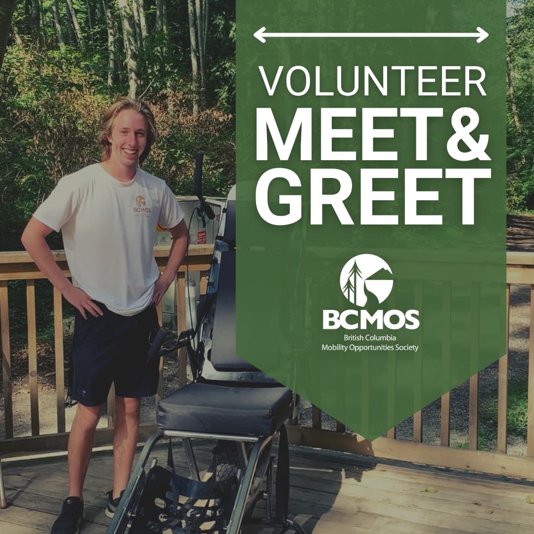 BCMOS volunteer posing beside TrailRider in the woods. Volunteer meet and greet.