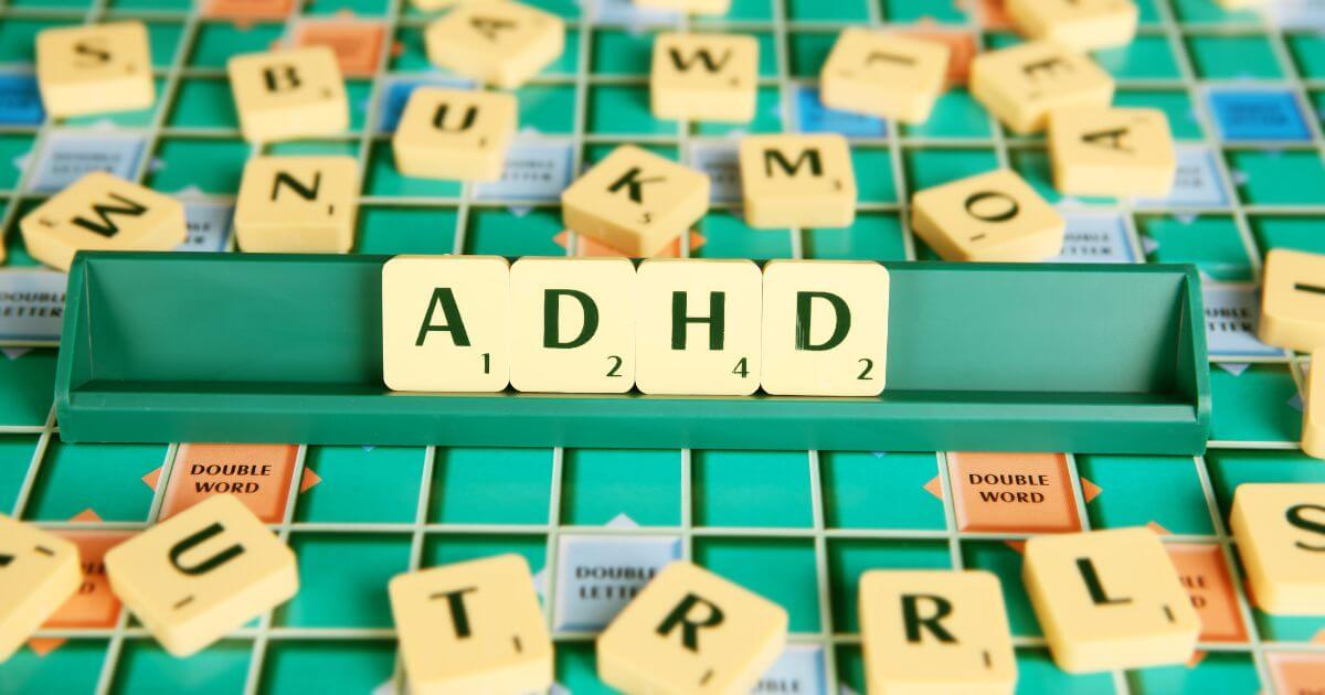 A board game displaying the acronym, ADHD